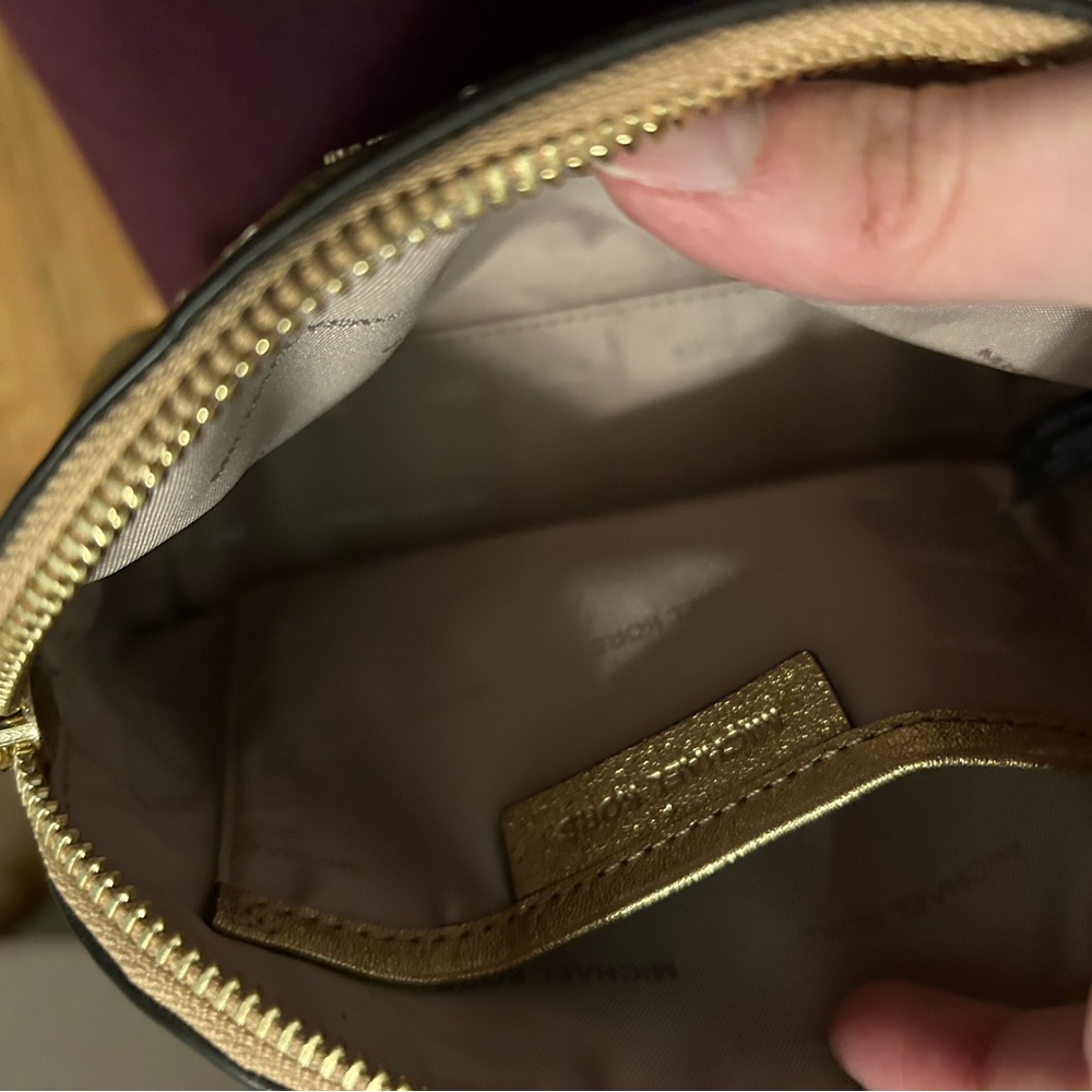 Micheal Kors gold makeup bag